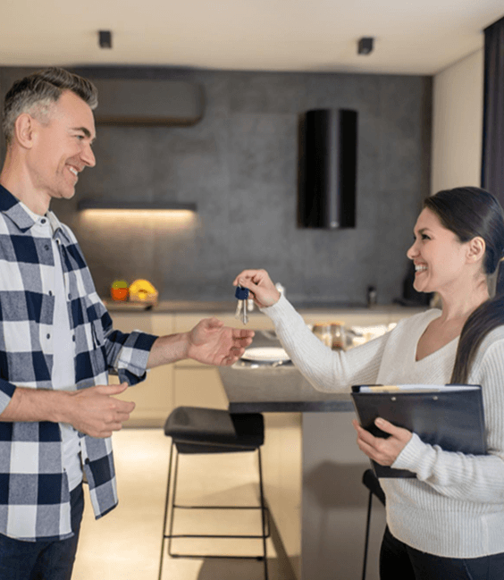 Hands holding holographic city buildings